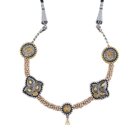 AARNA STUDDED WITH PEARL  STRING AND SILVER TRIBAL CHARMS, GOLD PLATED SILVER NECKPIECE
